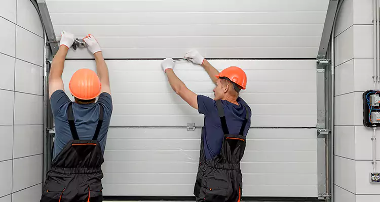 Garage Door Bottom Panel Repair in Alafaya, FL